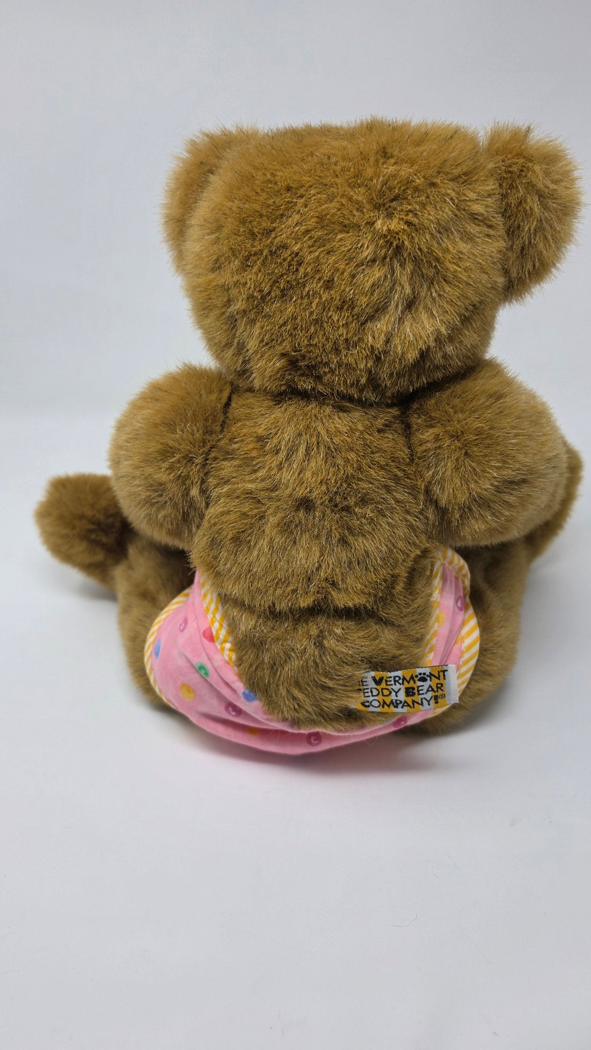 Vermont Teddy Bear baby bear back showing company tag