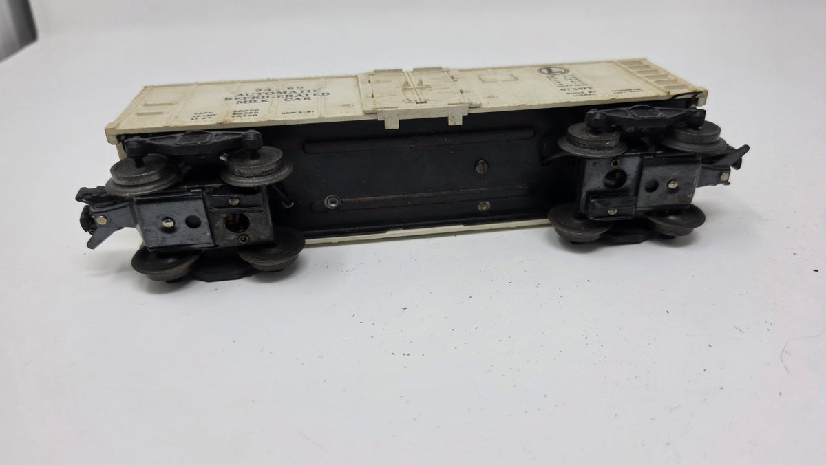 Lionel 3482 Automatic Refrigerated Milk Car with Platform — Used (O Gauge)