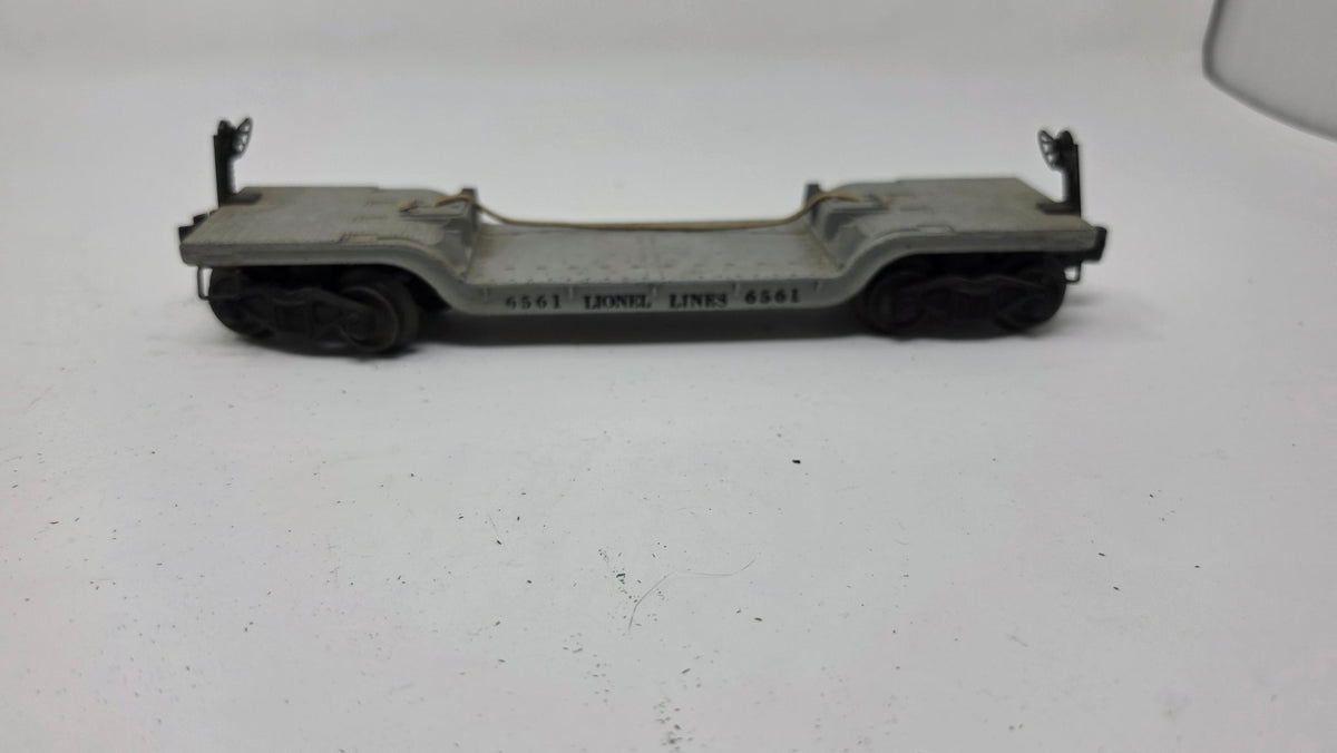Lionel 6561 Gray Flat Car with Cable — Used (O Gauge)