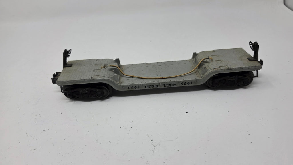 Lionel 6561 Gray Flat Car with Cable — Used (O Gauge)